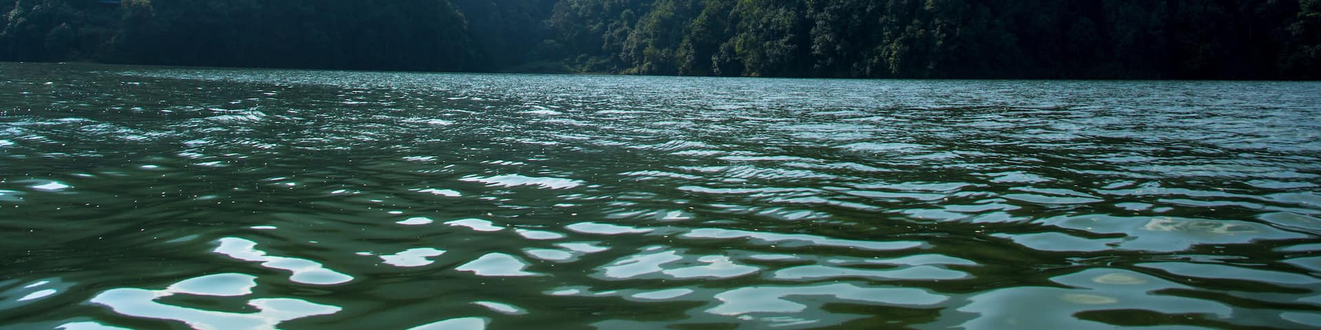 Phewa Lake and hills in Pokhara, a popular tourist destination. Taken in Nepal, Dec 2018