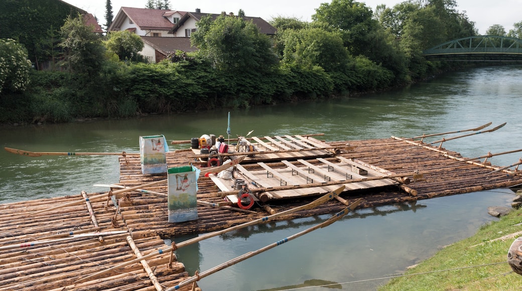 Timber rafts as a tourist attraction are normally assembled daily anew. Here you can see a panorama picture of the landing in Wolfratshausen (Schrederleiten) in the morning in which the construction takes places on the river Loisach in the season from May to August.