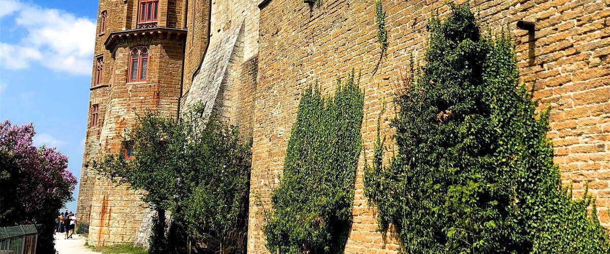 Hohenzollern Castle is the ancestral seat of the imperial House of Hohenzollern. Located atop Mount Hohenzollern, above and south of Hechingen, on the edge of the Swabian Jura of central Baden-Württemberg, Germany.
The castle was completely destroyed in 1423 after a ten-month siege by the free imperial cities of Swabia. A larger and sturdier structure was constructed from 1454 to 1461, which served as a refuge for the Catholic Swabian Hohenzollerns, including during the Thirty Years' War. By the end of the 18th century it was thought to have lost its strategic importance and gradually fell into disrepair, leading to the demolition of several dilapidated buildings.
The final castle was built between 1846 and 1867 as a family memorial by Hohenzollern scion King Frederick William IV of Prussia. Architect Friedrich August Stüler based his design on English Gothic Revival architecture and the Châteaux of the Loire Valley. In 1945 it briefly became the home of the former Crown Prince Wilhelm of Germany, son of the last Hohenzollern monarch, Kaiser Wilhelm II.