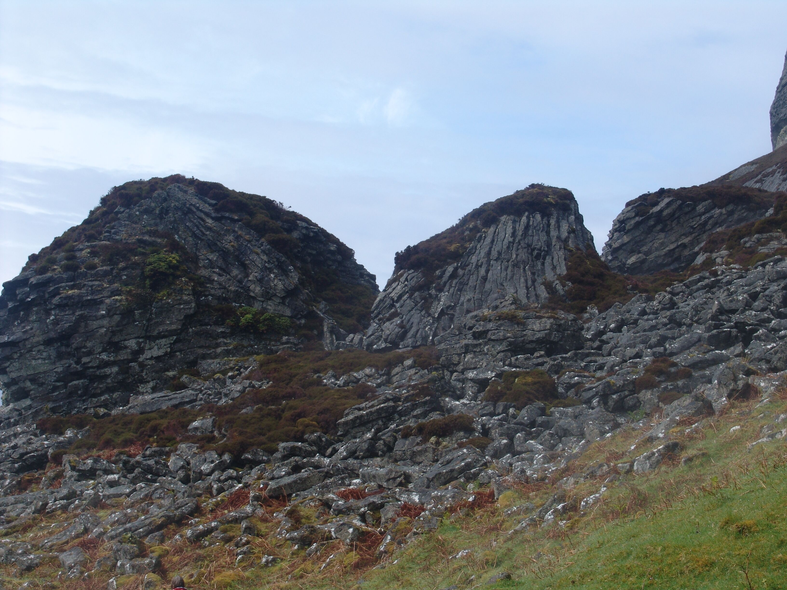 Columnar cooling joints in rhyodacitic pitchstone lava of Paleogene age at An Sgùrr (The Sgurr of Eigg) on the island of Eigg in Scotland.