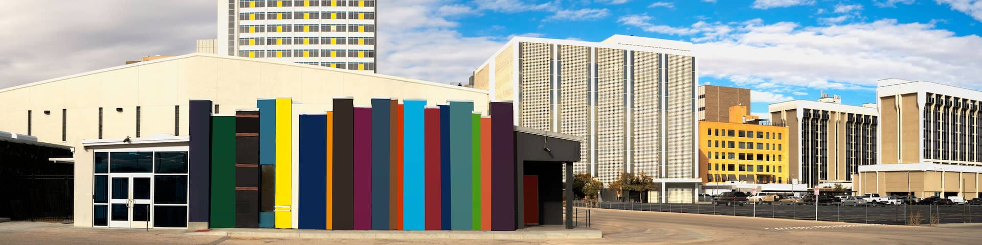 Colorful city buildings in Midland Texas, bright surreal modern cityscape