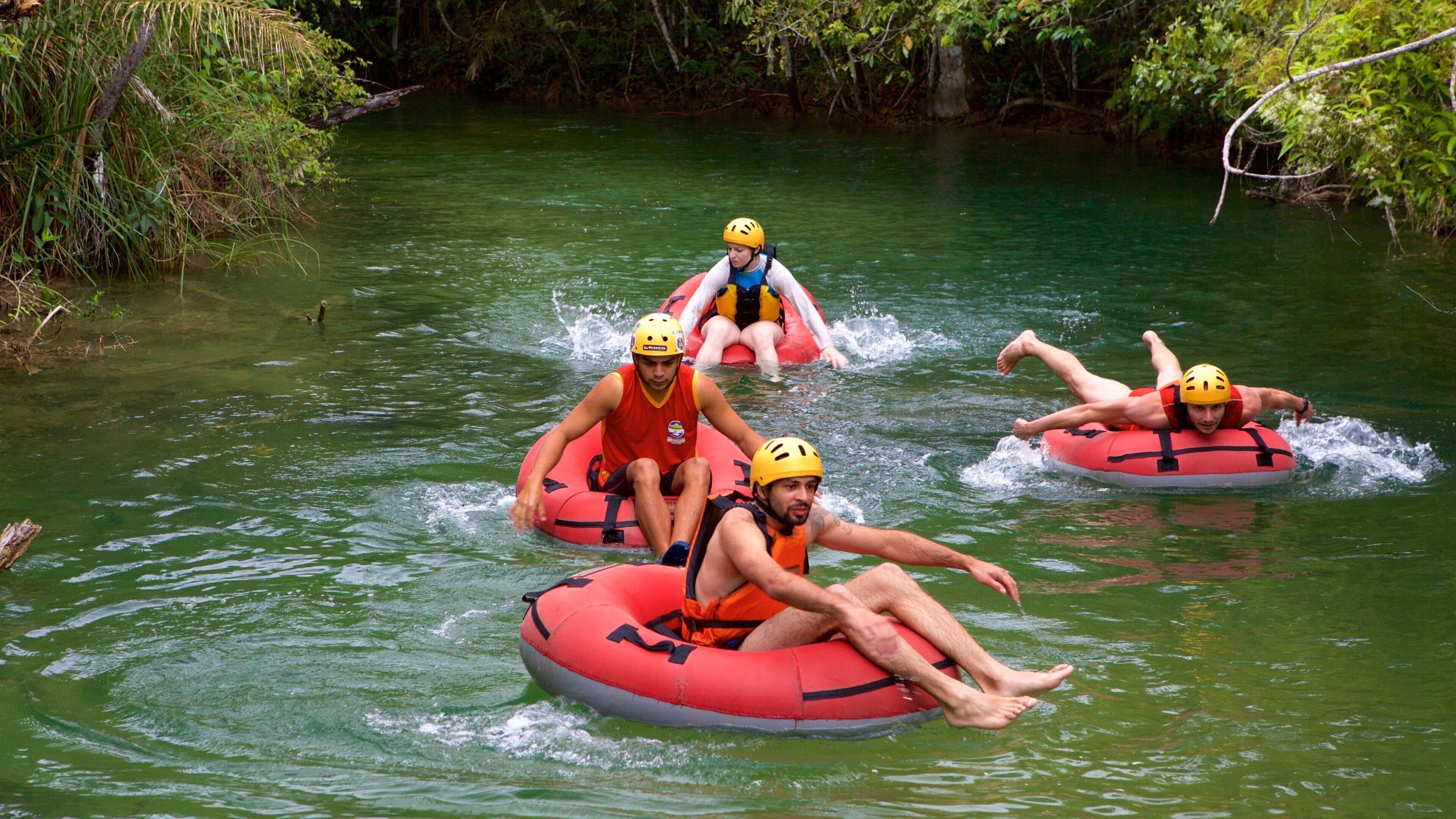 Formosa River Ecological Park showing a river or creek and watersports as well as a small group of people