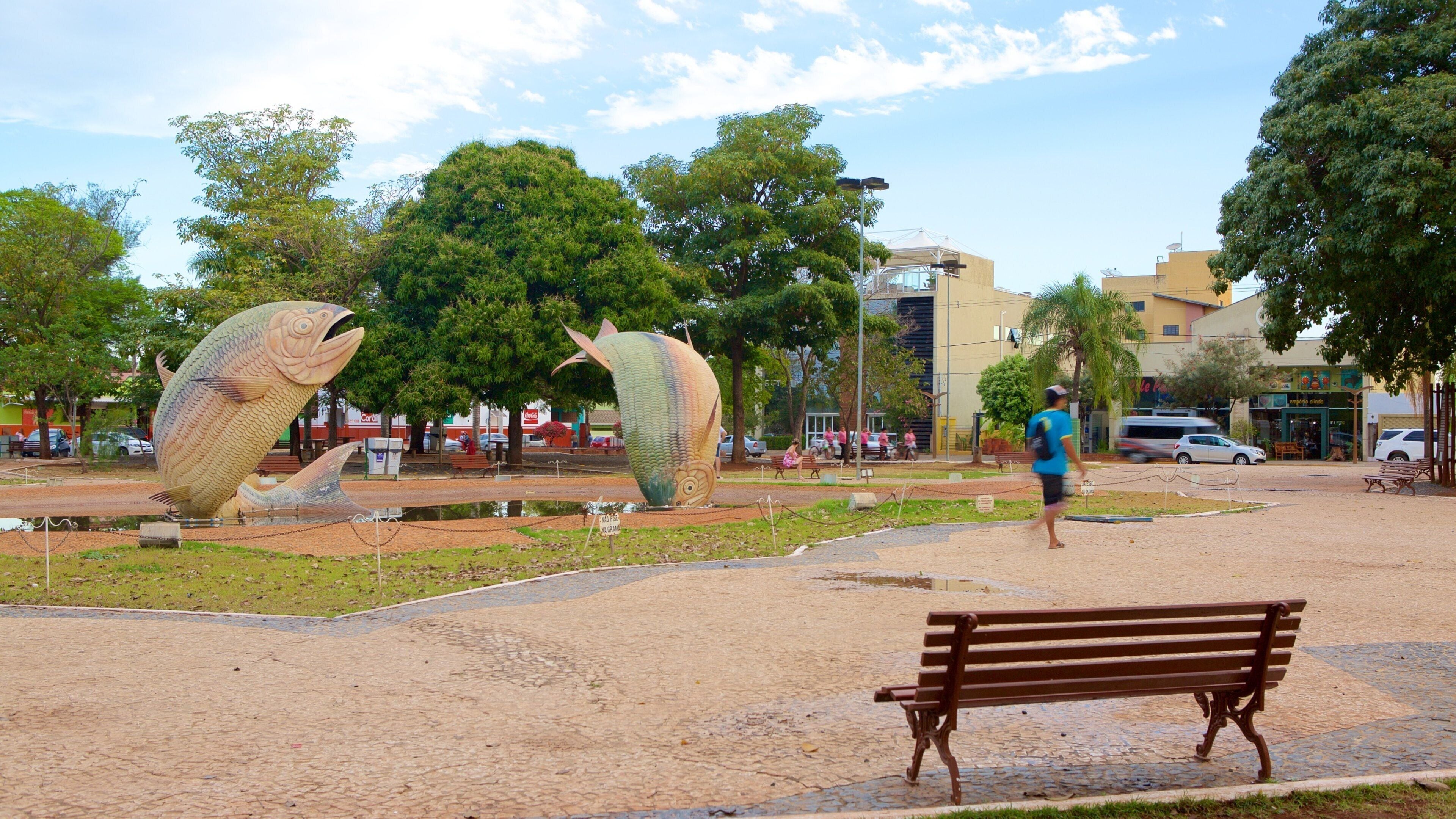 Liberty Square showing a statue or sculpture and a garden