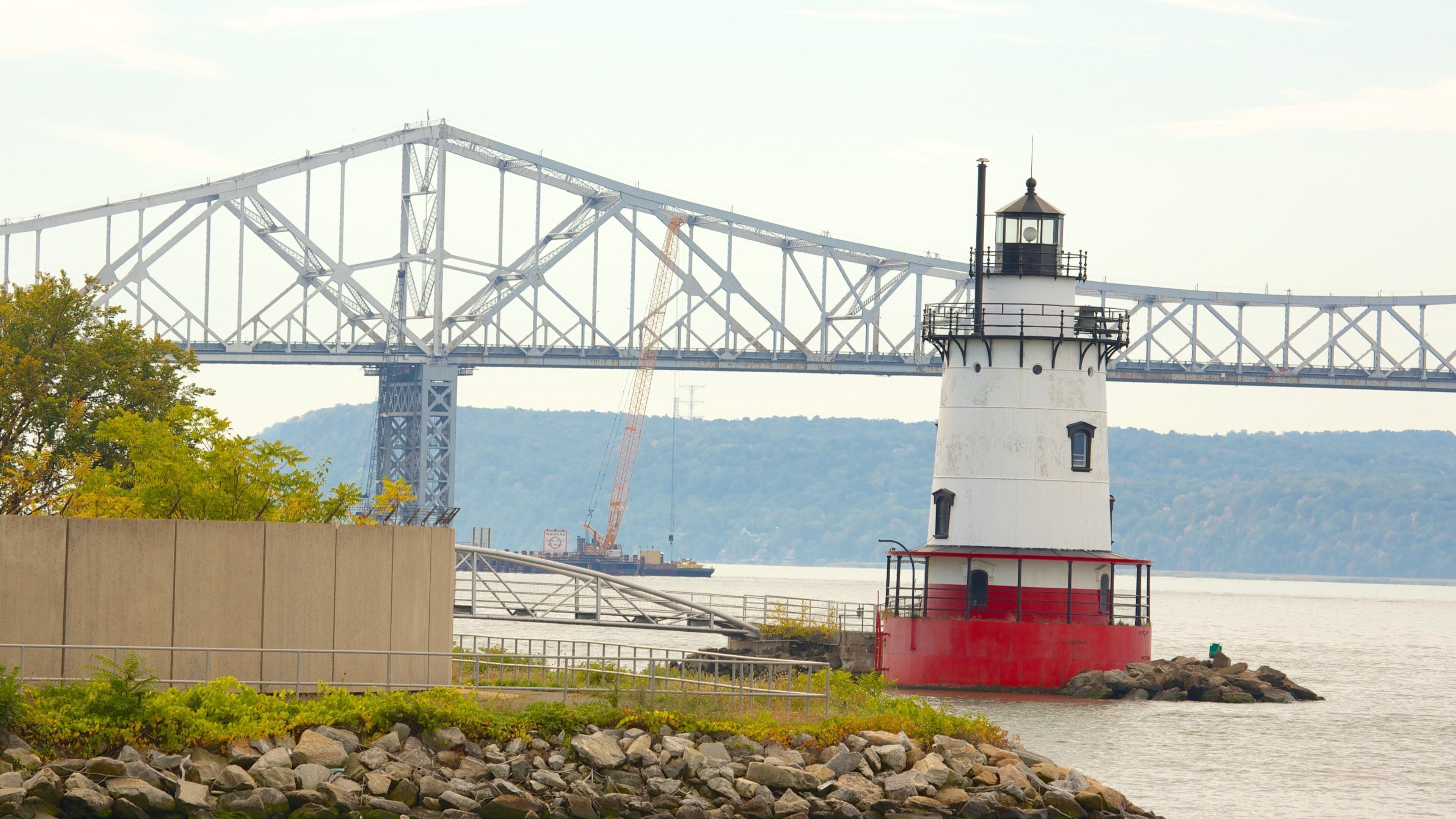 Sleepy Hollow which includes a river or creek, a bridge and a lighthouse
