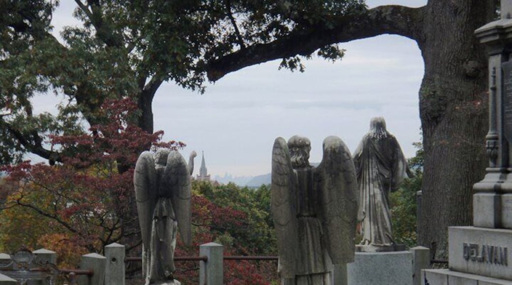 On a clear day, if you climb to the top of the cemetery, you can see the New York City skyline down the Hudson River.