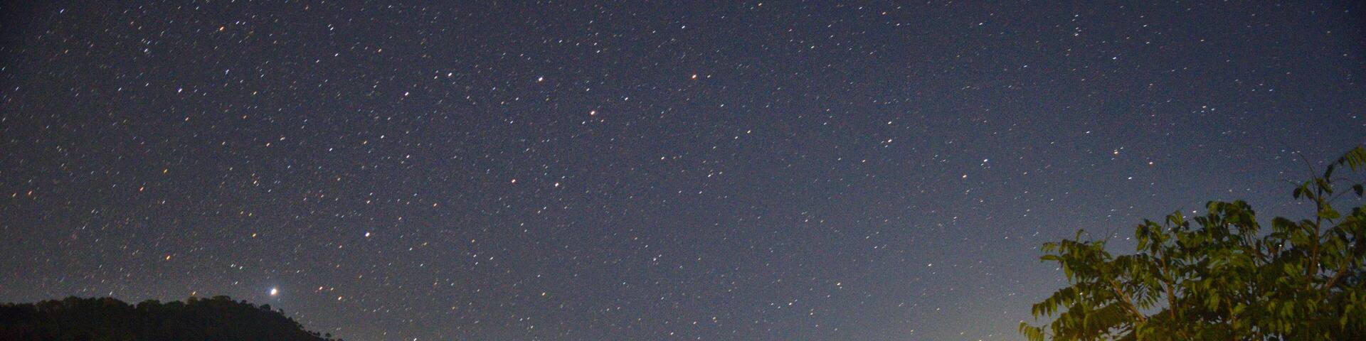 The take and its refference at night
Stars and trees.