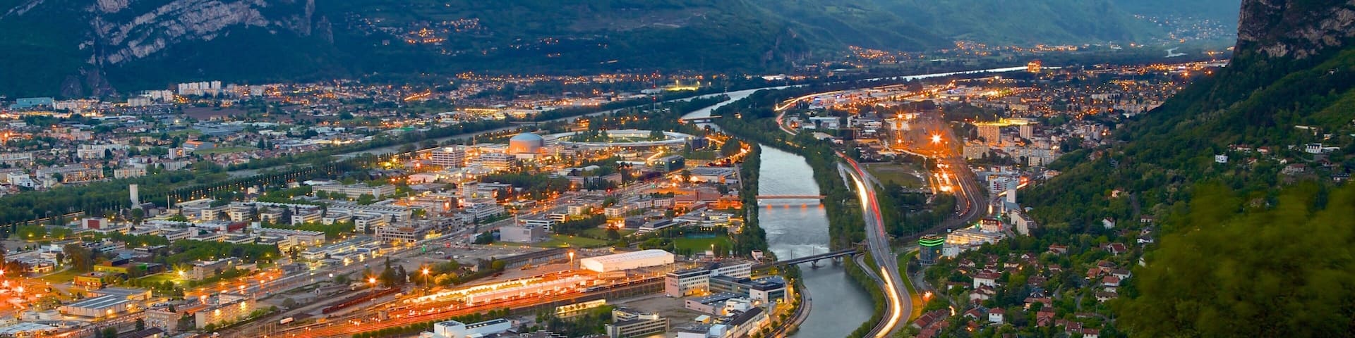 Grenoble-Bastille Cable Car showing a city and a river or creek