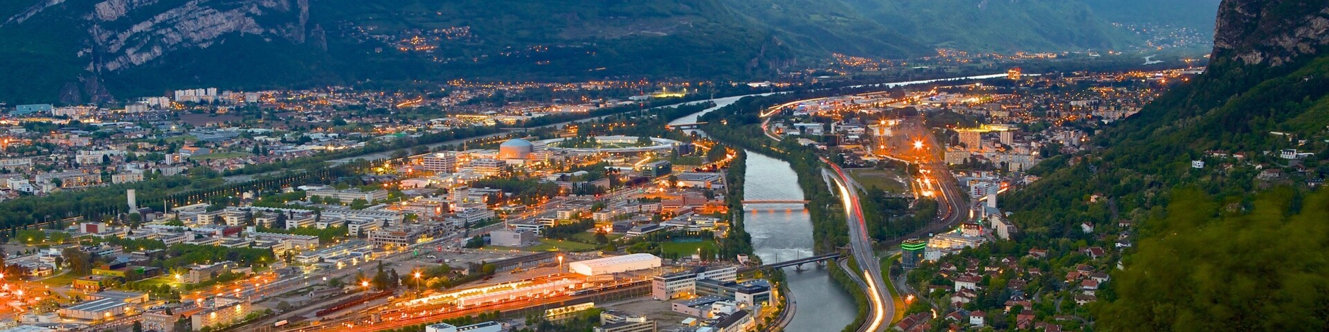 Grenoble-Bastille Cable Car showing a city and a river or creek
