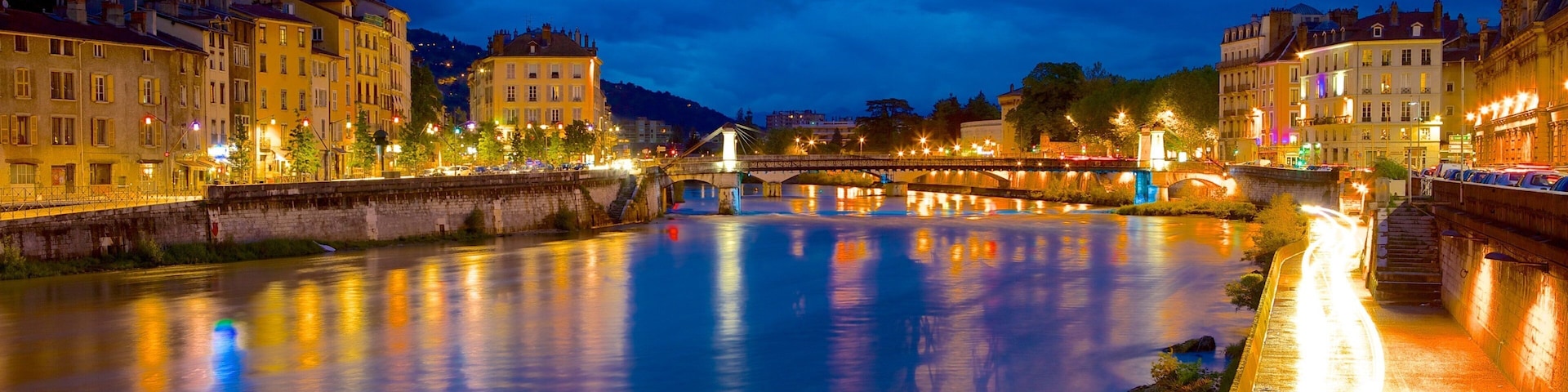 Grenoble-Bastille Cable Car featuring night scenes, a river or creek and a city