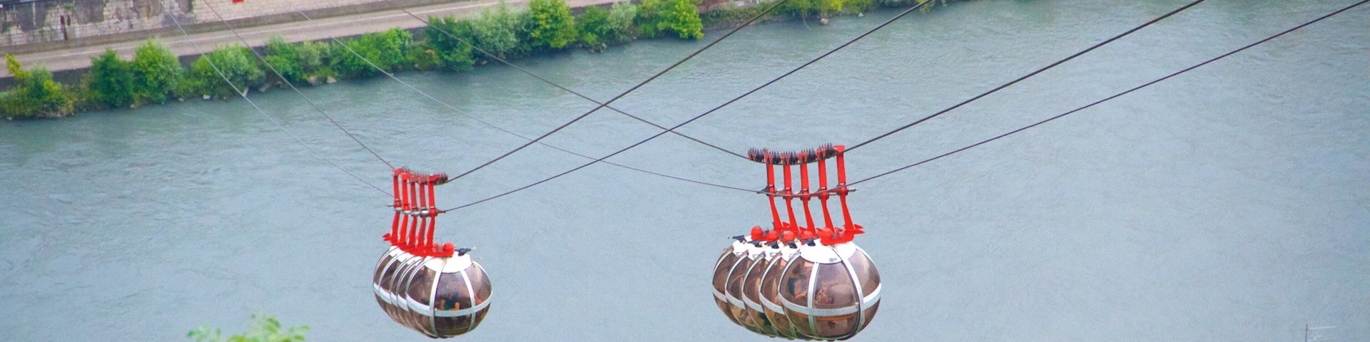 Grenoble-Bastille Cable Car which includes a river or creek and a gondola