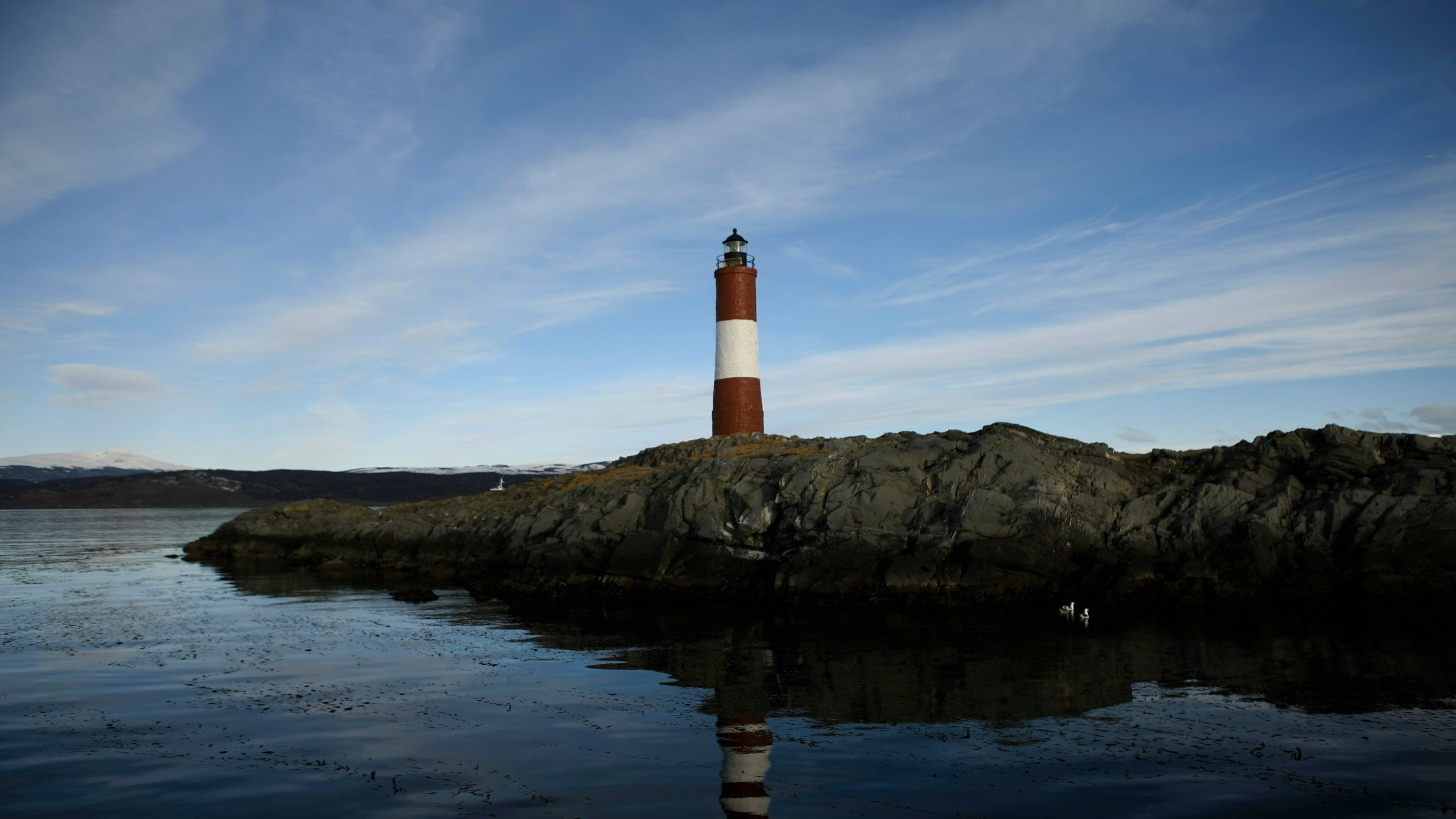 Tierra del Fuego which includes a lighthouse and general coastal views