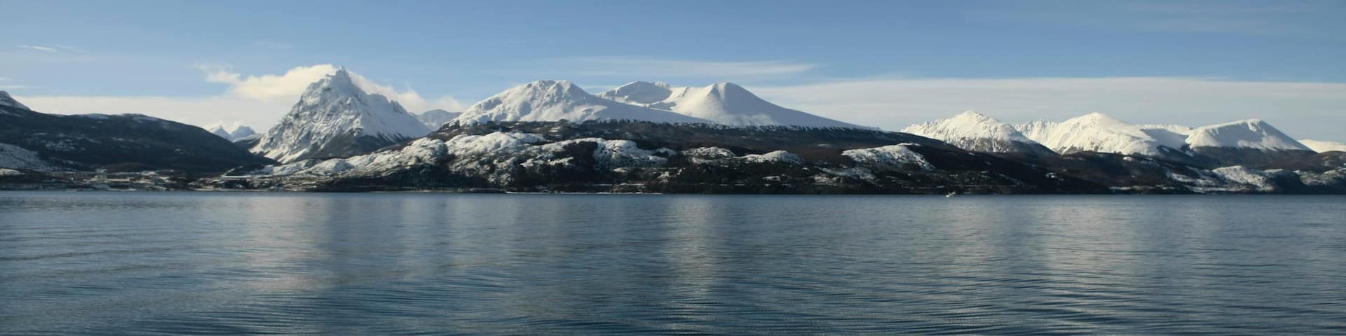 Tierra del Fuego featuring mountains, general coastal views and snow