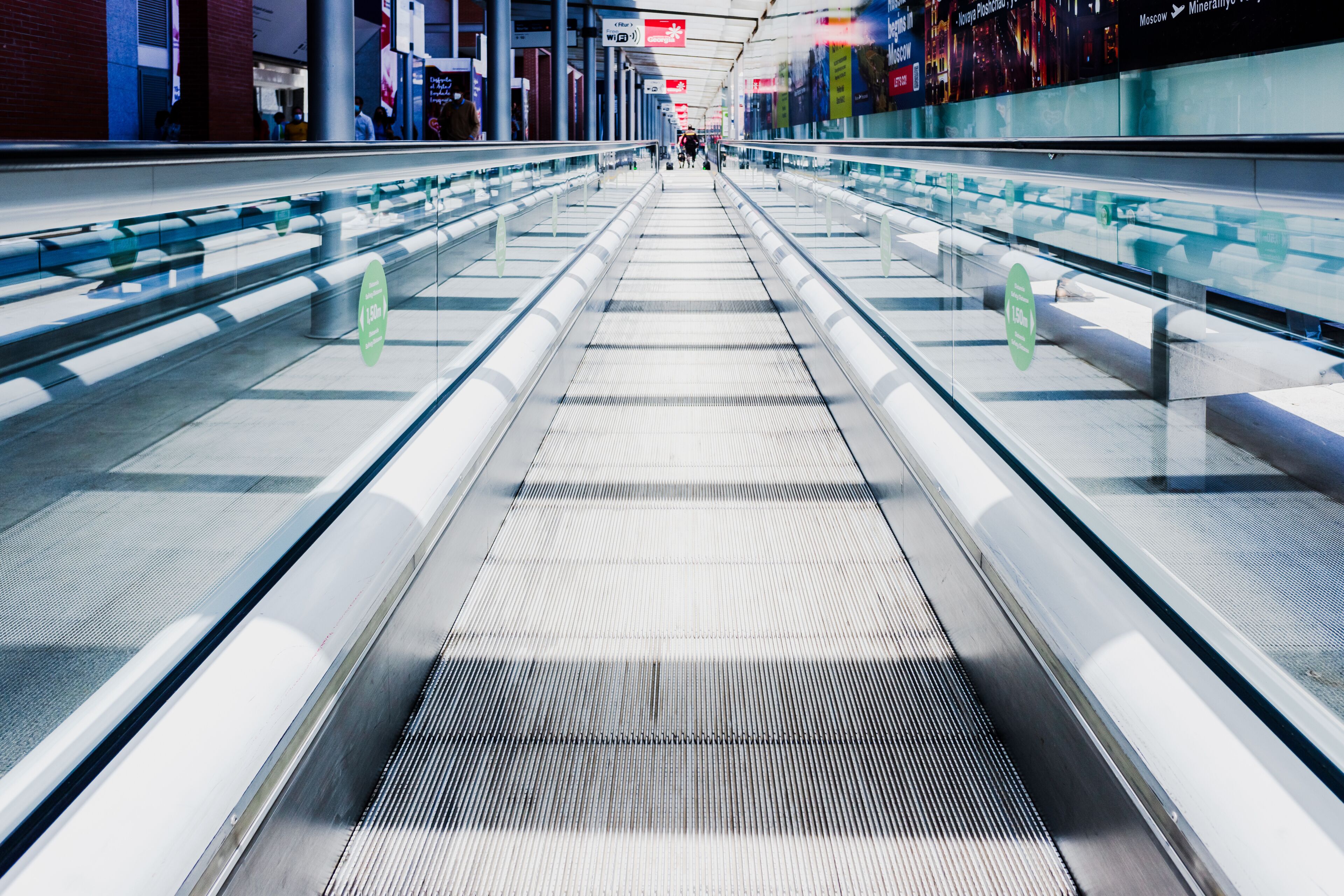 Madrid, Spain - May 20, 2021: Flat scalator mechanical walkway to speed up the pedestrian crossing in an Ifema pavilion.