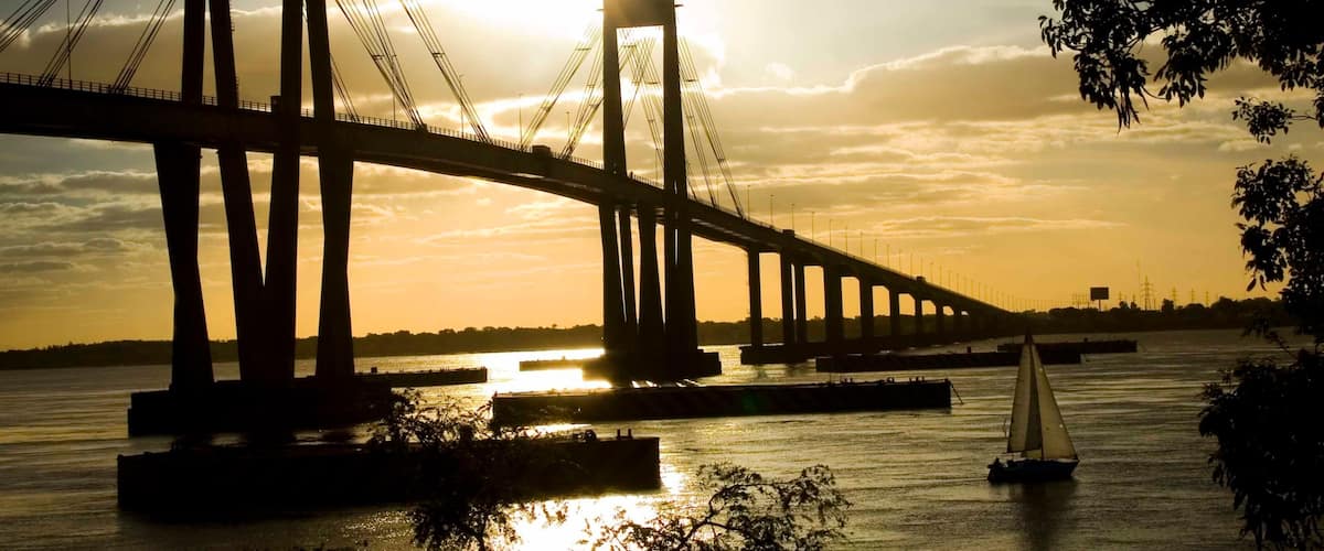 Chaco featuring a bridge, a sunset and general coastal views