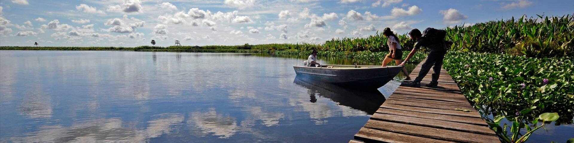 Formosa which includes boating and a river or creek as well as a small group of people