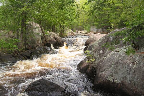 The Menominee river flows along the Menominee Iron Range in Upper Michigan and northeastern Wisconsin, and the impact of these minerals is quite obvious at Dave's Falls, a great set of waterfalls right off of Highway 141 just north of Green Bay. It's a great little hike, but be sure to pack your bug spray, as the mosquitoes are abundant!