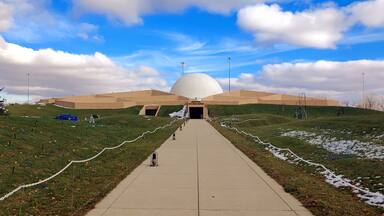 A shot at distance of the unique architecture of the Armstrong Air & Space Museum.
Earth was mounded around the steel-reinforced concrete building, giving the building the semblance of being underground. Designed to accommodate the Astro Theater for multimedia film and sound presentations, the central sphere dominates the entire complex. The fifty-six feet wide dome enhances the futuristic moon-base design.
#Trovember