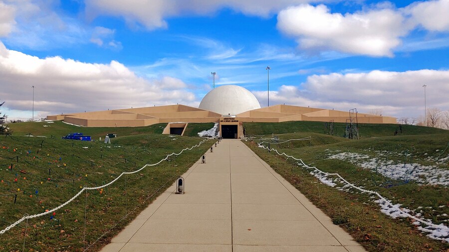 A shot at distance of the unique architecture of the Armstrong Air & Space Museum.
Earth was mounded around the steel-reinforced concrete building, giving the building the semblance of being underground. Designed to accommodate the Astro Theater for multimedia film and sound presentations, the central sphere dominates the entire complex. The fifty-six feet wide dome enhances the futuristic moon-base design.
#Trovember