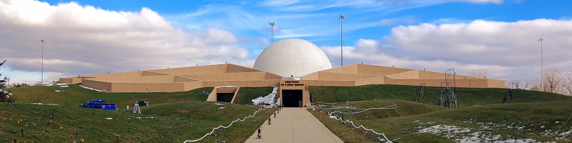 A shot at distance of the unique architecture of the Armstrong Air & Space Museum.
Earth was mounded around the steel-reinforced concrete building, giving the building the semblance of being underground. Designed to accommodate the Astro Theater for multimedia film and sound presentations, the central sphere dominates the entire complex. The fifty-six feet wide dome enhances the futuristic moon-base design.
#Trovember