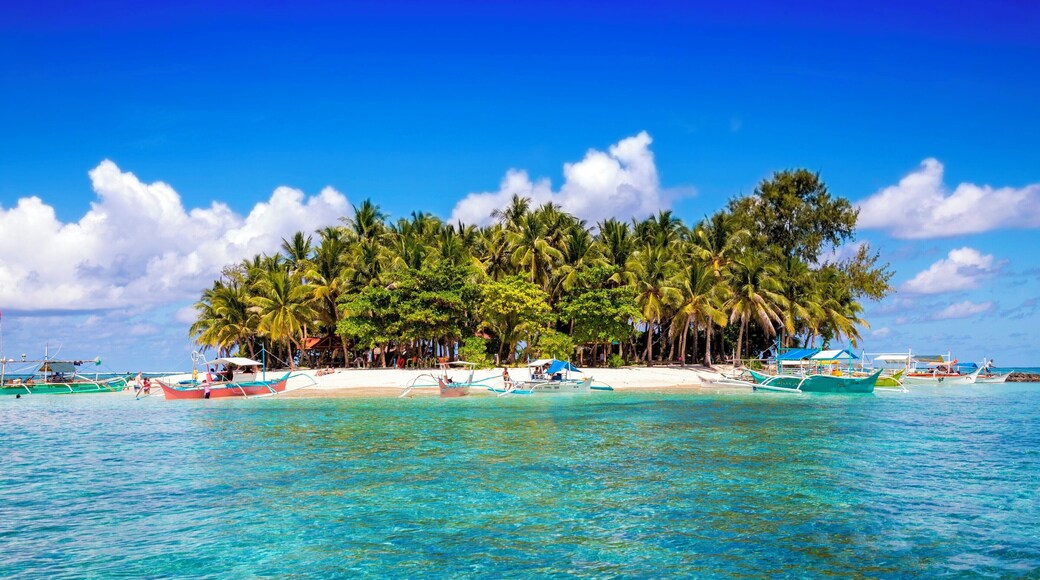 Guyam Island is just one rental boat away from Siargao, Philipinnes. It is a tiny tropical island but has an amazing beach. #LifeAtExpedia