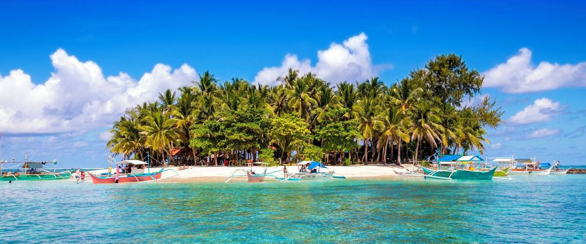 Guyam Island is just one rental boat away from Siargao, Philipinnes. It is a tiny tropical island but has an amazing beach. #LifeAtExpedia