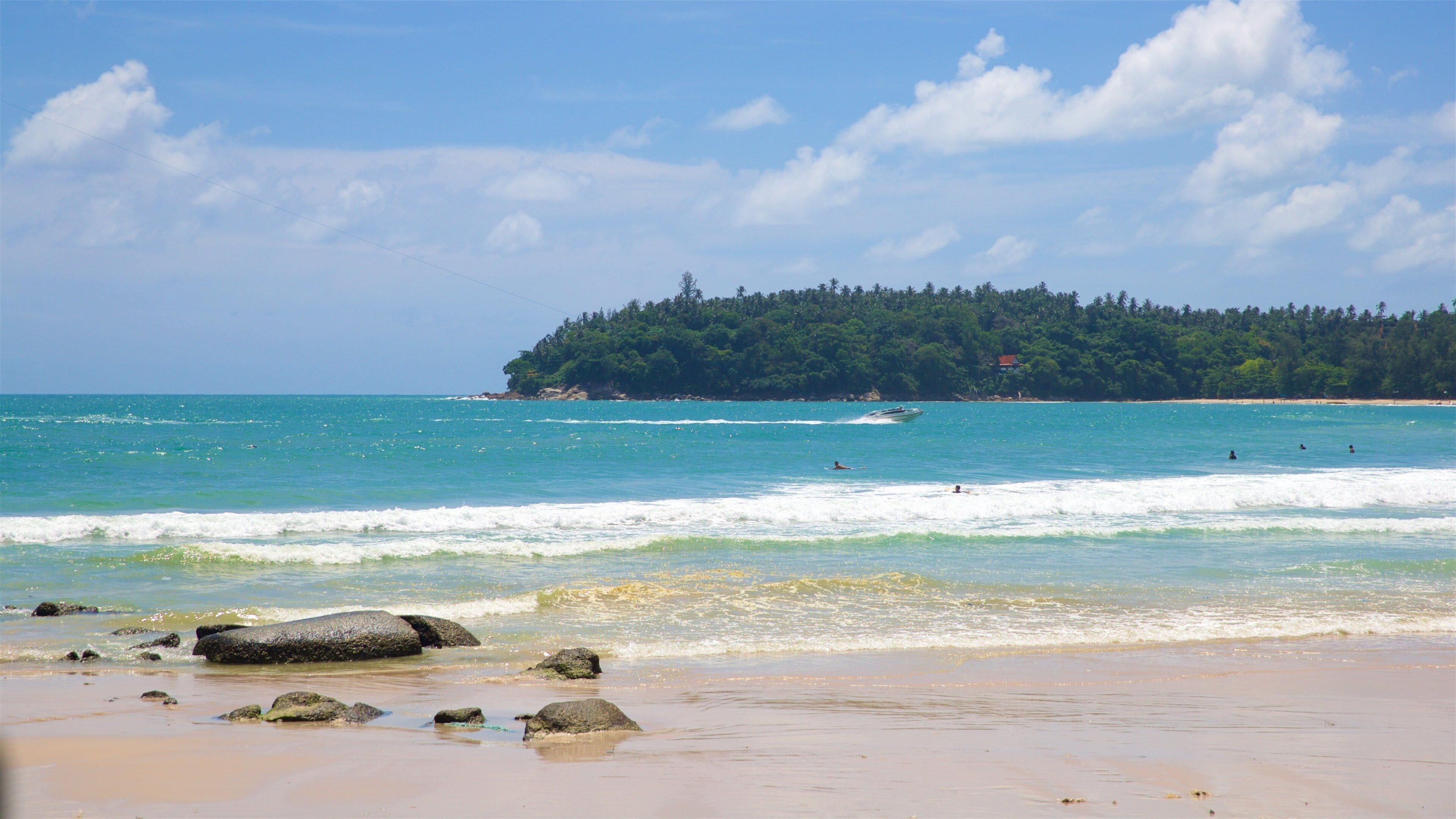 Kata Beach showing rugged coastline, general coastal views and swimming
