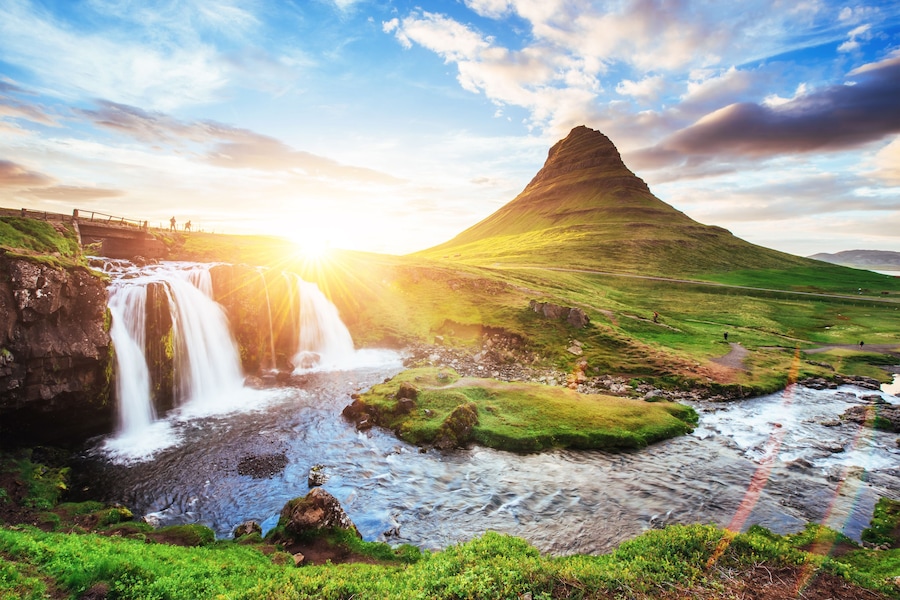 The picturesque sunset over landscapes and waterfalls. Kirkjufell mountain, Iceland.; Shutterstock ID 778366795; Purchase Order: SP-2355 (Design) Corporate Benefits DE and AT- banner refresh; Client/L