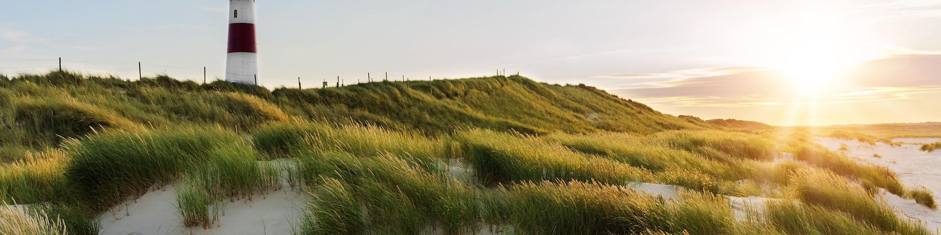 Lighthouse List East at sunset with sunstar, Ellenbogen, Sylt, Schleswig-Holstein, Germany, Shutterstock ID 321653501, Purchase Order: SP-1394 HA Batch 3 Part 1, Order Number: , Client/Licensee: HomeA