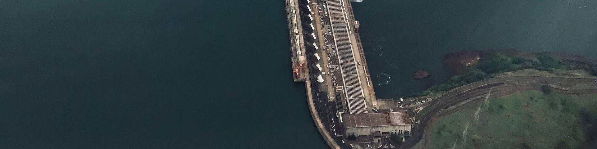 The Itaipu Dam is a hydroelectric dam on the Paraná River located on the border between Brazil and Paraguay. The construction of the dam was first contested by Argentina, but the negotiations and resolution of the dispute ended up setting the basis for Argentine–Brazilian integration later on. Wikipedia