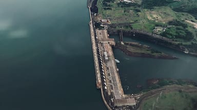 The Itaipu Dam is a hydroelectric dam on the Paraná River located on the border between Brazil and Paraguay. The construction of the dam was first contested by Argentina, but the negotiations and resolution of the dispute ended up setting the basis for Argentine–Brazilian integration later on. Wikipedia