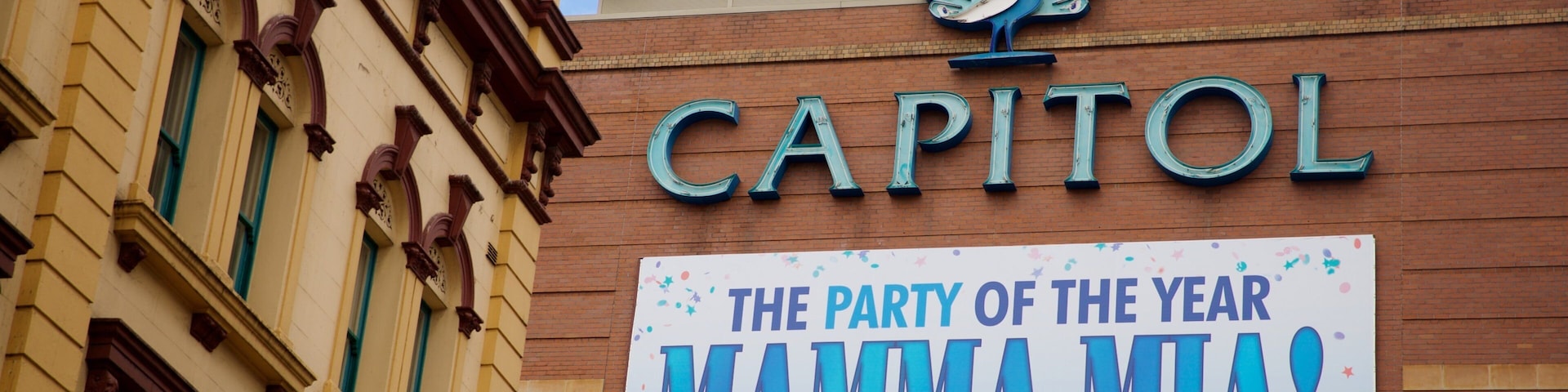 Capitol Theatre which includes signage