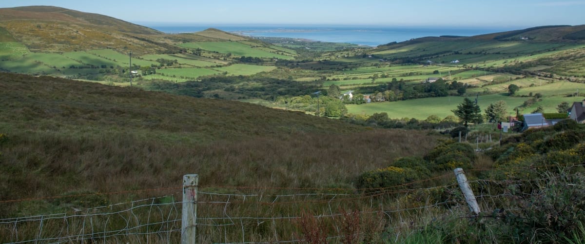 This is a view off of the scenic route circling Dingle Peninsula in County Kerry, Ireland. #blue skies and water in the distance. 😊 I can't wait to go back!