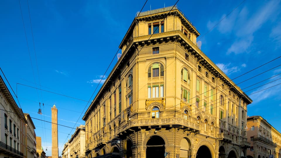 A historic building with ornate architecture and a clear blue sky.