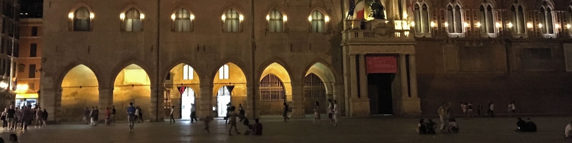 Palazzio d'Accursio on The Piazza Maggiore, Bologna at night. The palace was once the administrative centre of Bologna. Located on the Piazza Maggiore, it was the city's Town Hall until 2008. The palace is now home to the Civic Art Collection, with paintings from the Middle Ages to the 19th century, and the town libraries.