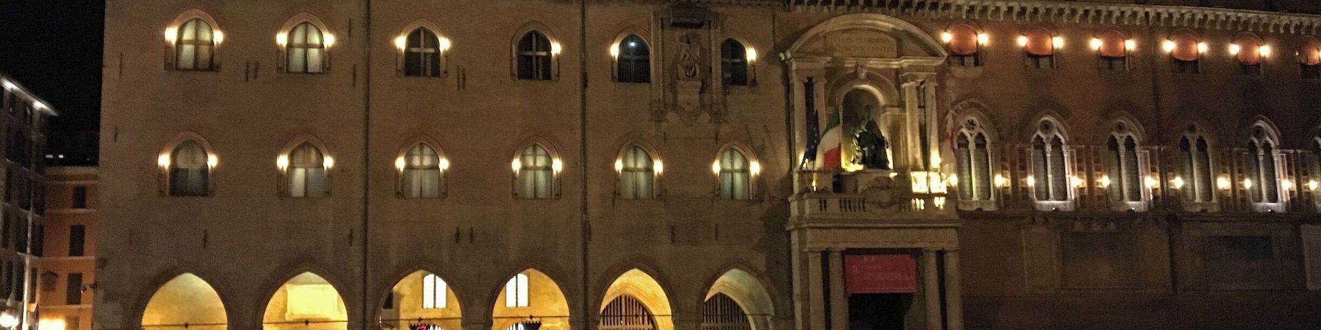 Palazzio d'Accursio on The Piazza Maggiore, Bologna at night. The palace was once the administrative centre of Bologna. Located on the Piazza Maggiore, it was the city's Town Hall until 2008. The palace is now home to the Civic Art Collection, with paintings from the Middle Ages to the 19th century, and the town libraries.