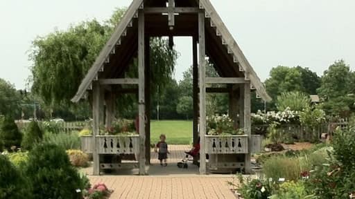 Open gardens with a variety of flower, fruit, and spice specimens.