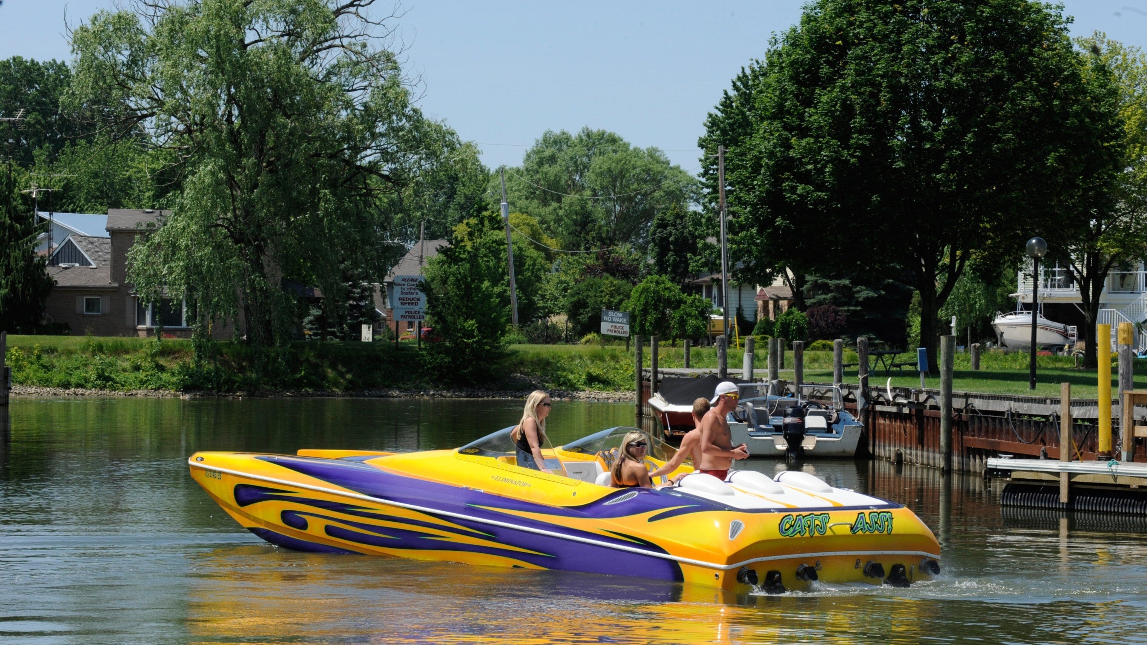 Southern Ontario featuring a river or creek and boating as well as a small group of people