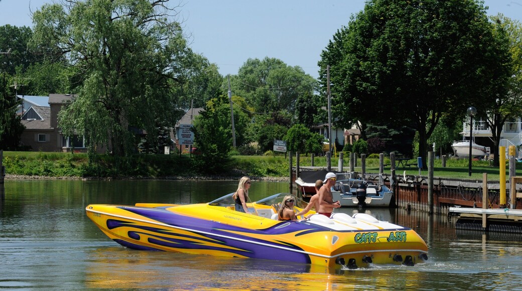 Southern Ontario featuring a river or creek and boating as well as a small group of people