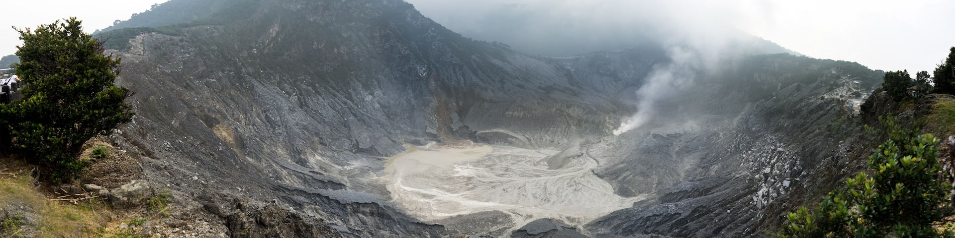 Mount crater tangkuban parahu or tangkuban perahu with active volcano smoke in Bandung, west java, Indonesia.
