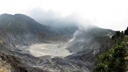 Mount crater tangkuban parahu or tangkuban perahu with active volcano smoke in Bandung, west java, Indonesia.