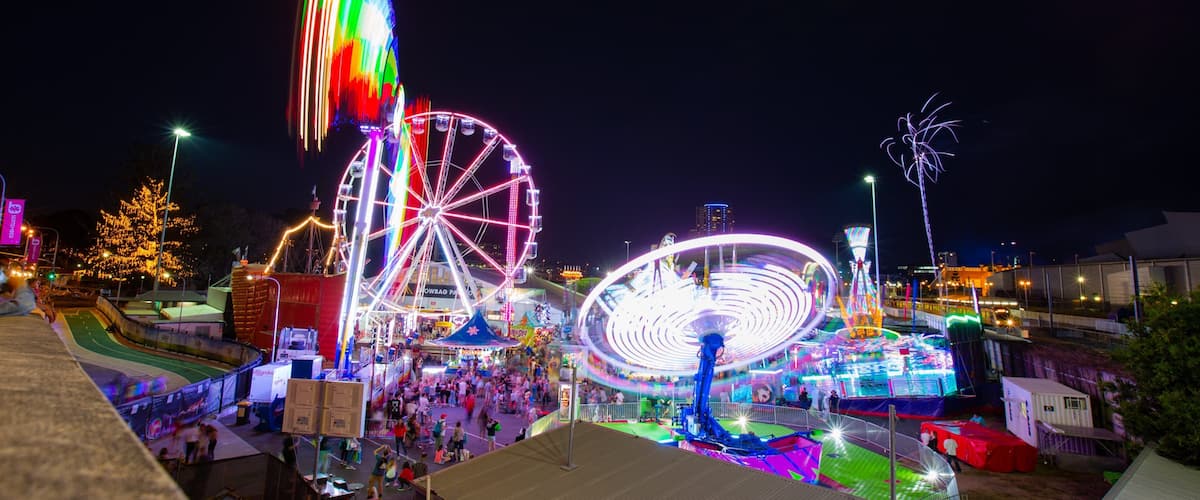 RNA Showgrounds which includes rides and night scenes