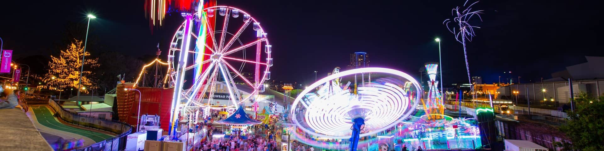 RNA Showgrounds which includes rides and night scenes
