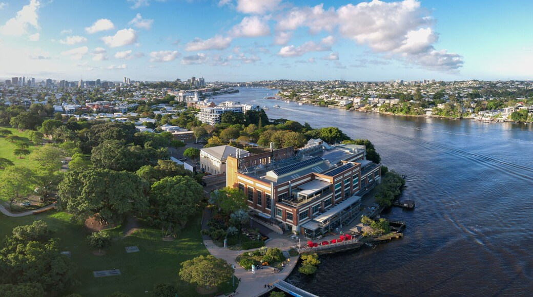 Aerial view of brisbane powerhouse and brisbane river with new farm park in an urban landscape, new farm, australia.