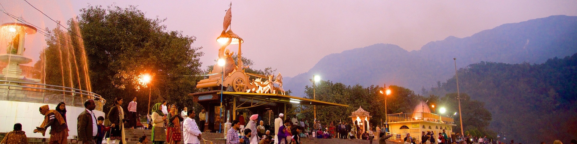 Triveni Ghat showing religious aspects as well as a small group of people