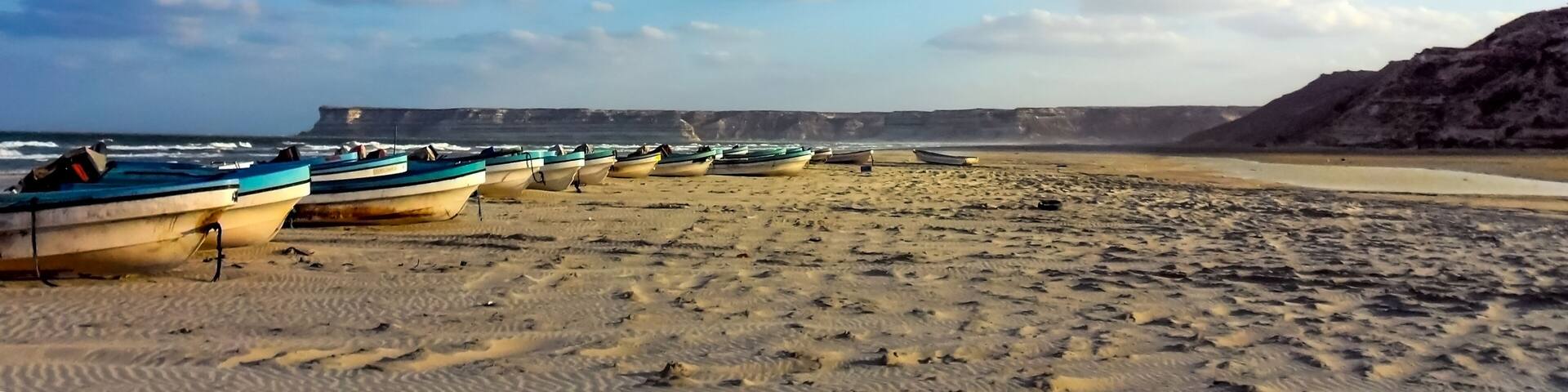 Fishing boats on the Ras Markez beach in the Oman