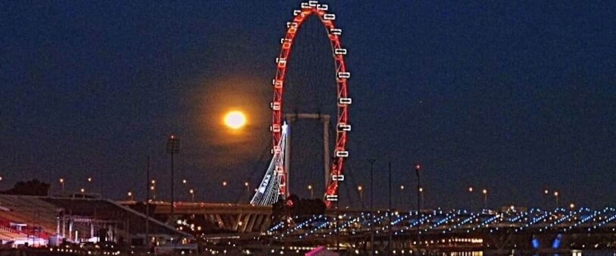 Moon rising over the harbor