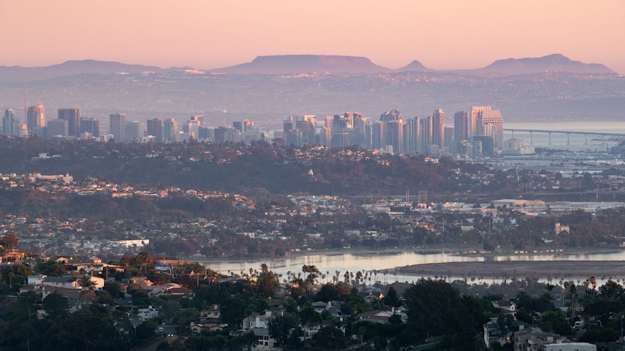 Mount Soledad showing a sunset, a city and landscape views