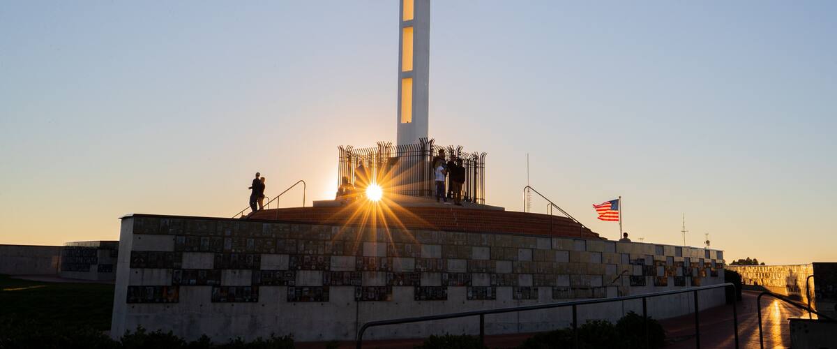 Mount Soledad which includes a monument, a sunset and religious aspects