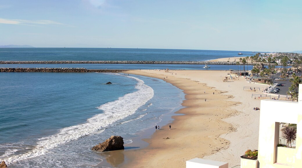 Panorama of Southern California coastline. View of the marina coastal access to the harbor from a rocky cliff. Corona Del Mar, Newport Beach, California