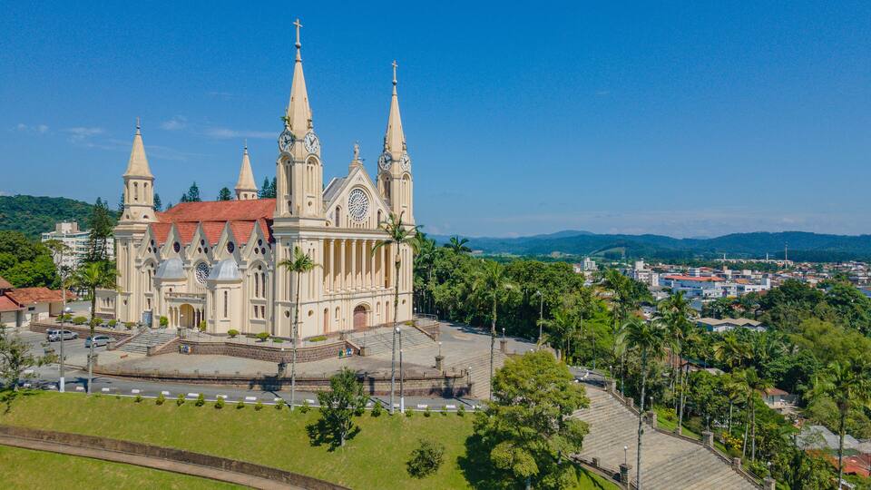 A large cathedral with multiple spires and a clock tower.